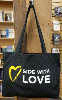 image of black Side With Love large tote bag