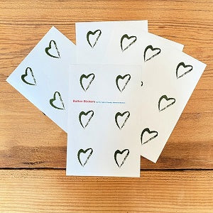 image of Forest Green Side with Love Environmental Justice Heart Stickers