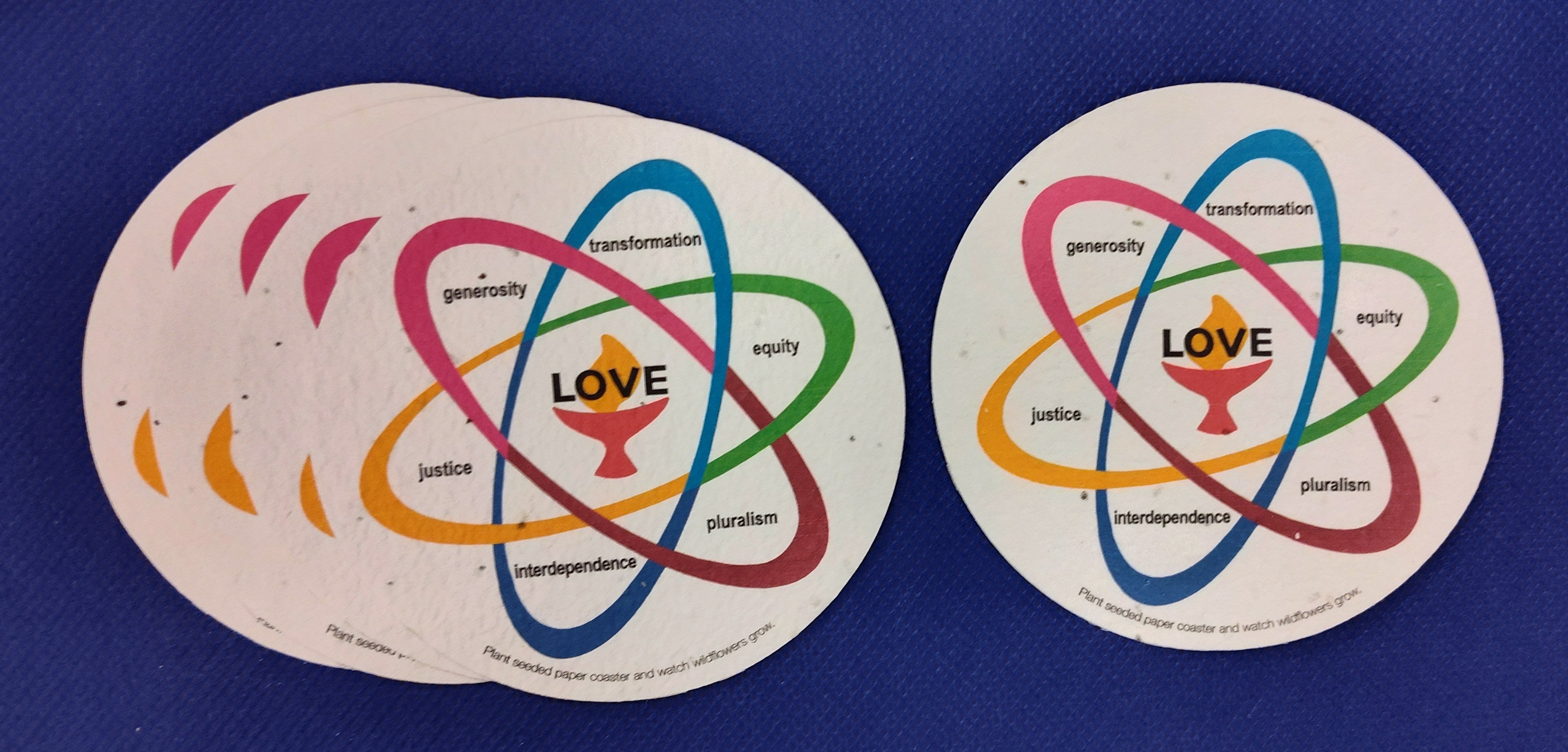 image of UU Shared Values Seed Paper Coasters with colorful atom design