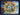 Colorful sun-shaped artwork with a central Earth illustration against a blue sky background.