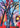 Colorful abstract painting of a tree with a vibrant background