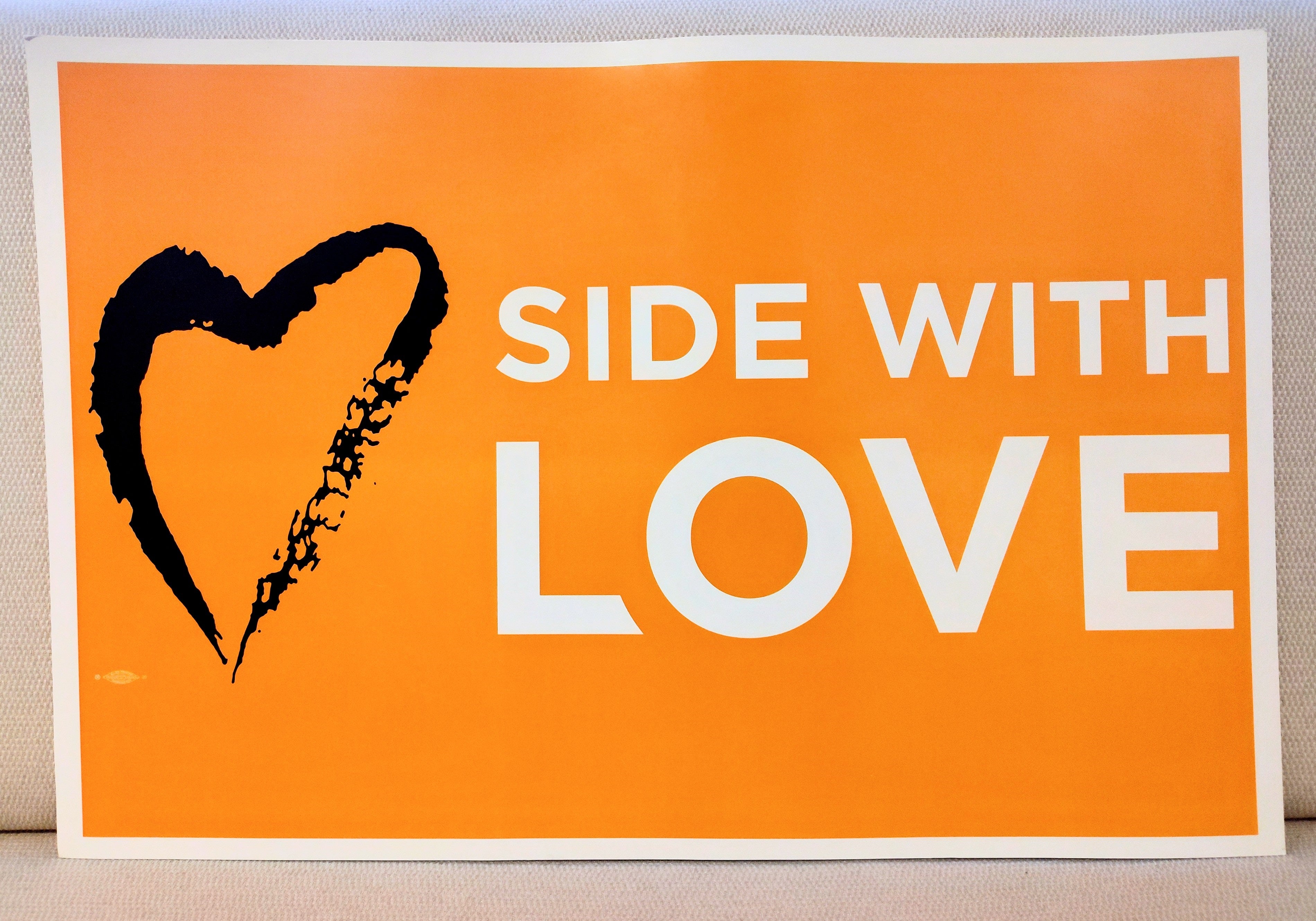 image of yellow Side With Love Rally Signs