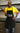 image of man wearing Side With Love black apron