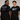 Two people wearing black Trans Joy is Sacred t-shirts 
