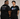 Two people wearing black Trans Joy is Sacred adult t-shirts