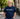 Man wearing a navy blue t-shirt with 'UU the VOTE' logo outdoors